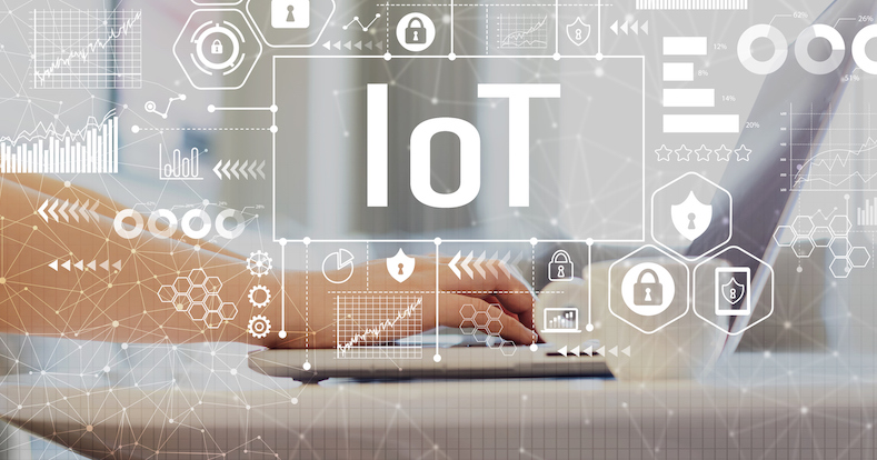 IoT with woman using a laptop on a coffee table