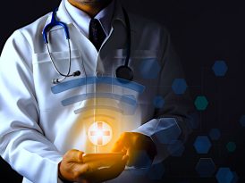 Doctor in white coat is using a WiFi connection