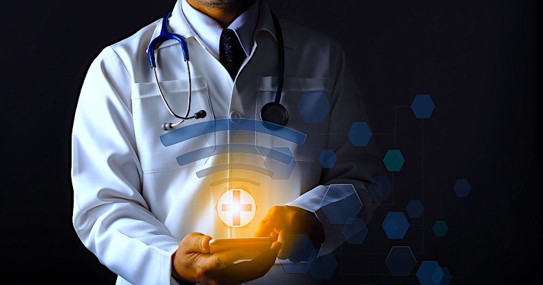 Doctor in white coat is using a WiFi connection