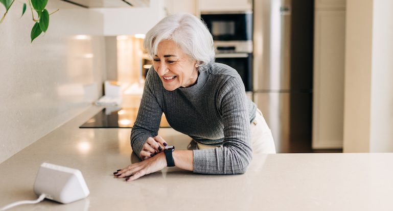 Senior woman using smart devices