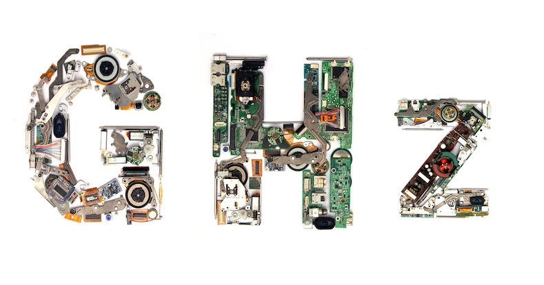 The word GHz made with letters that are made of computer parts
