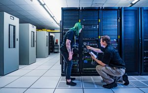 Co-workers in data center server room